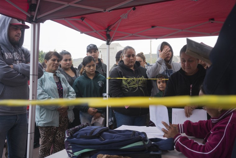 Migrants wait their turn to be called and seek asylum in the United States at "El chaparral" in Tijuana, Mexico.