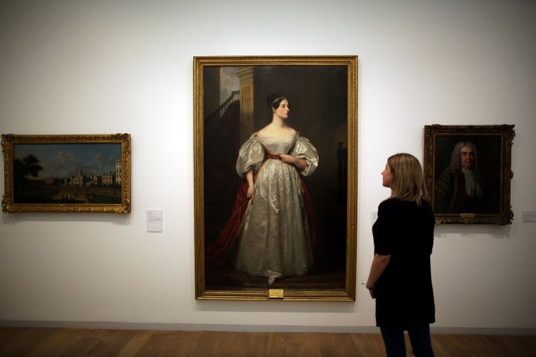 Image: A gallery employee looks at Margaret Carpenter's painting "Ada Lovelace (1815-1852)" at the Whitechapel Gallery exhibition in London on March 9, 2012.