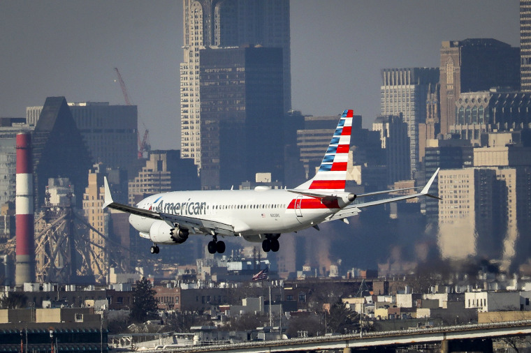 Image: An American Airlines Boeing 737 Max 8 lands at LaGuardia Airport in Queens, New York, on March 11, 2019.