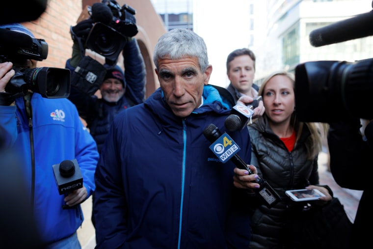 Image: William "Rick" Singer leaves federal court after being charged in a nationwide college admissions cheating scam in Boston on March 12, 2019.