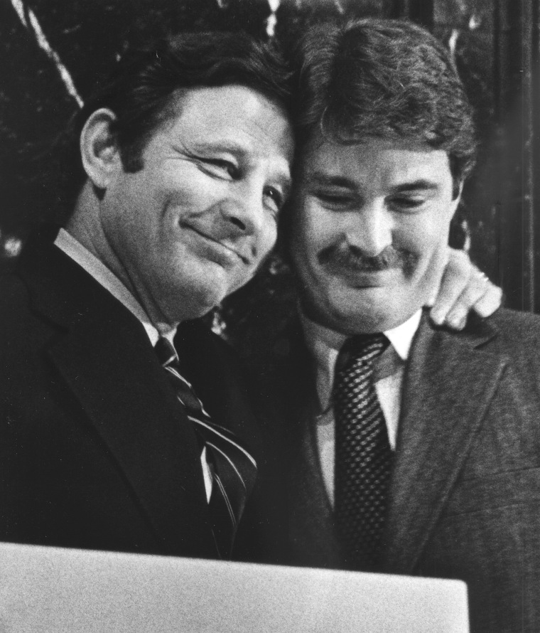 Image: Sen. Birch Bayh, D-Ind., hugs his son Evan at the Indiana House of Representatives in Indianapolis on March 6, 1980.