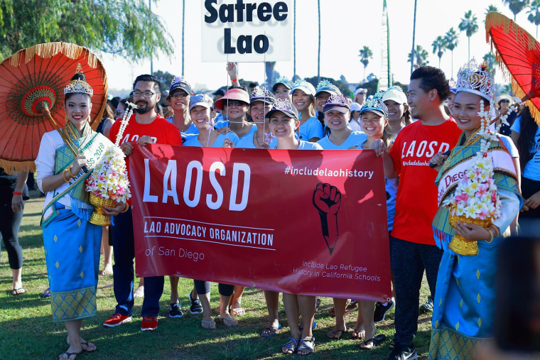 Members of LaoSD at a Lao boat racing festival.