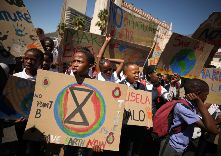 Image: Students take part in a global protest against climate change in Cape Town, South Africa