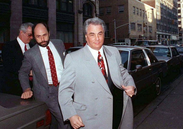 John Gotti, right, arrives at court in New York on Feb. 9, 1990.