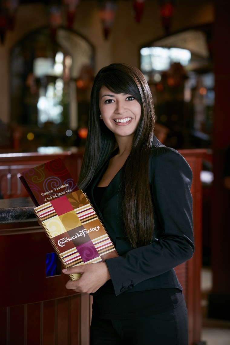 hostess with The Cheesecake Factory menu