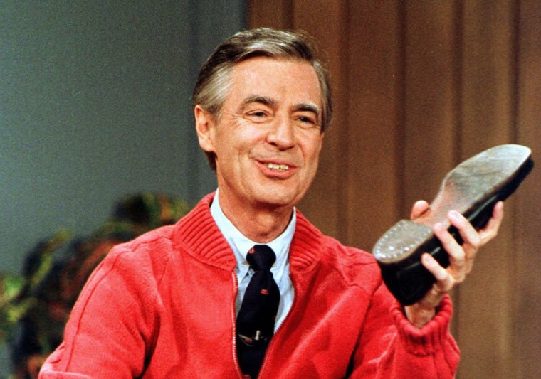 Fred Rogers rehearsing the opening of his PBS show "Mister Rogers' Neighborhood" during a taping in 1989.