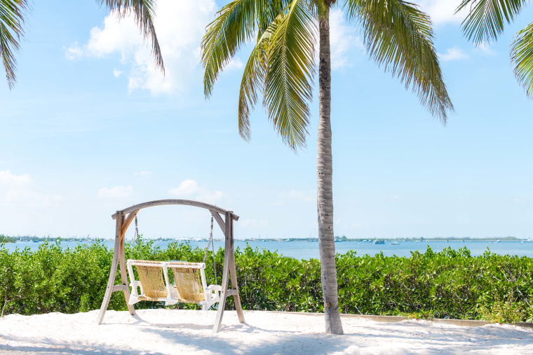 Two chairs with water views at Parrot Key Hotel &amp; Villas