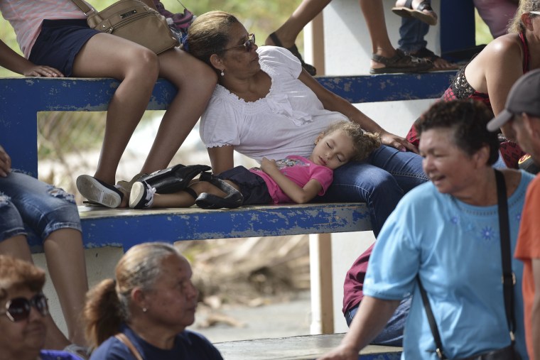 Image: People Queue to File FEMA Forms