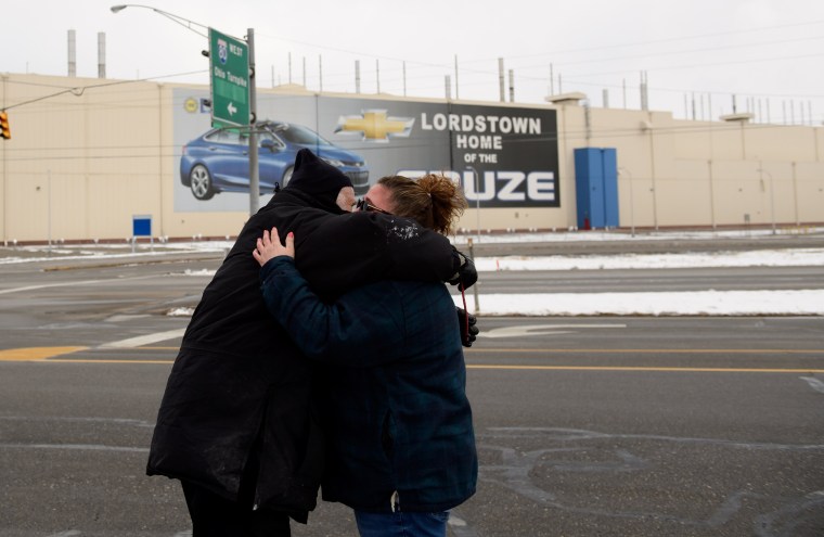 Image: Werner Lange greets Melissa Valinsky, who had just finished her last day after working at the GM Lordstown plant for 24 years, in Ohio on March 6, 2019.