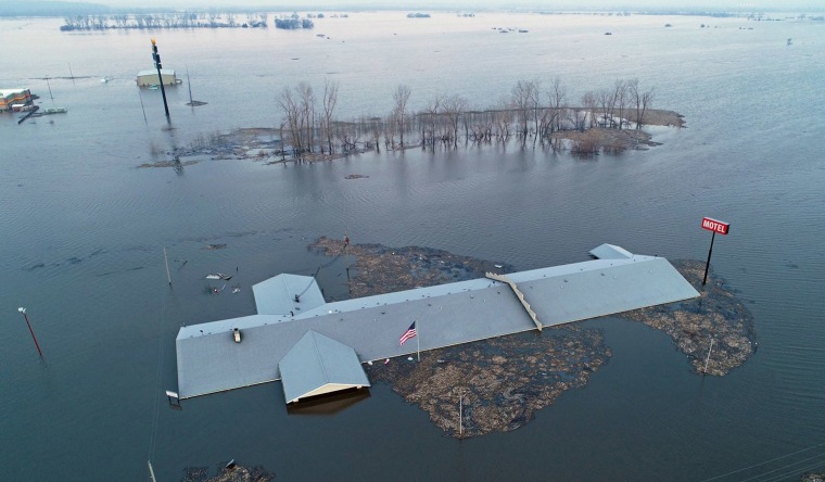 Image: The roof of the Bluff View Motel is seen during the flooding of the Missouri River near Glenwood