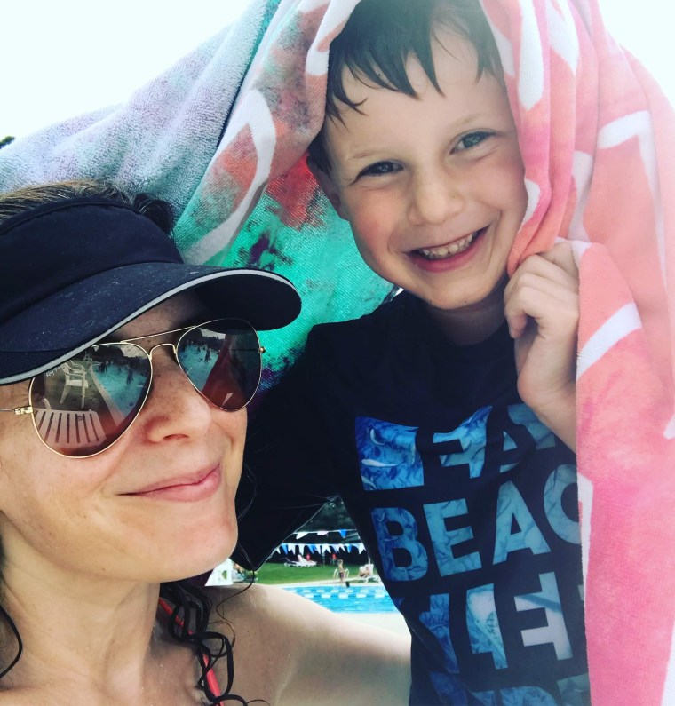 Wet hair don't care! Koenig and her son last summer enjoying the day at the local pool.