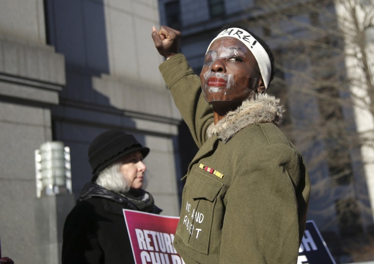 Image: Therese Okoumou rallies with supporters before her sentencing in New York on March 19, 2019.