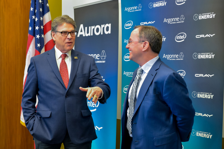 Image: Rick Perry, Bob Swan