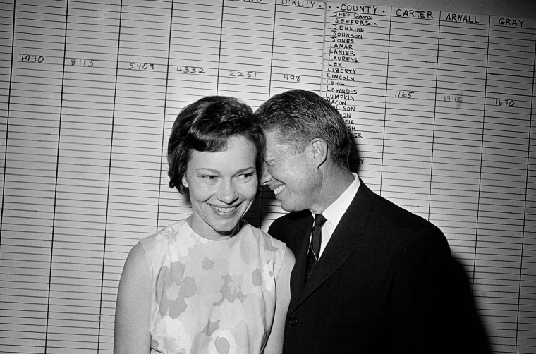 Image: Jimmy Carter hugs his wife, Rosalynn, at his Atlanta campaign headquarters on Sept. 15, 1966.