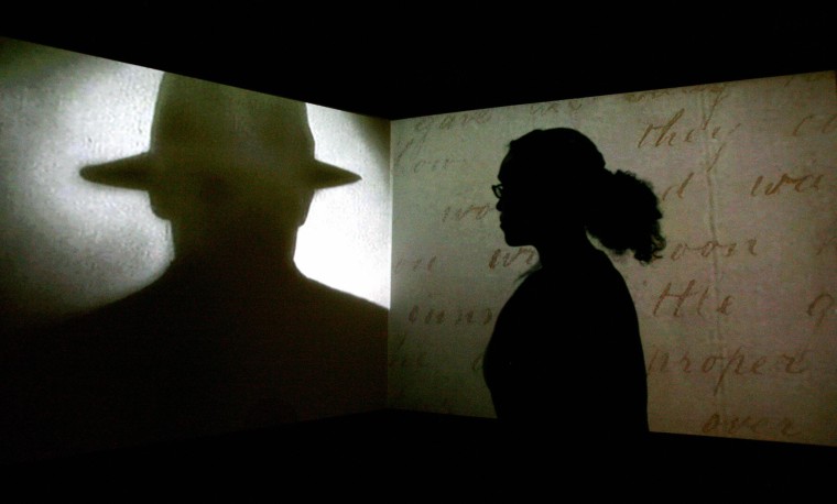 Image: A projection is displayed during the \"Jack the Ripper and the East End\" exhibition at Museum in Docklands, London, in 2008.