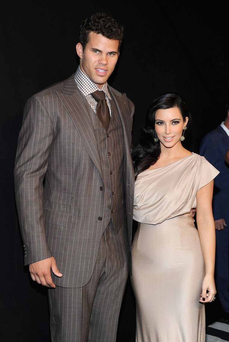 Image: NBA player Kris Humphries (L) and TV personality Kim Kardashian
