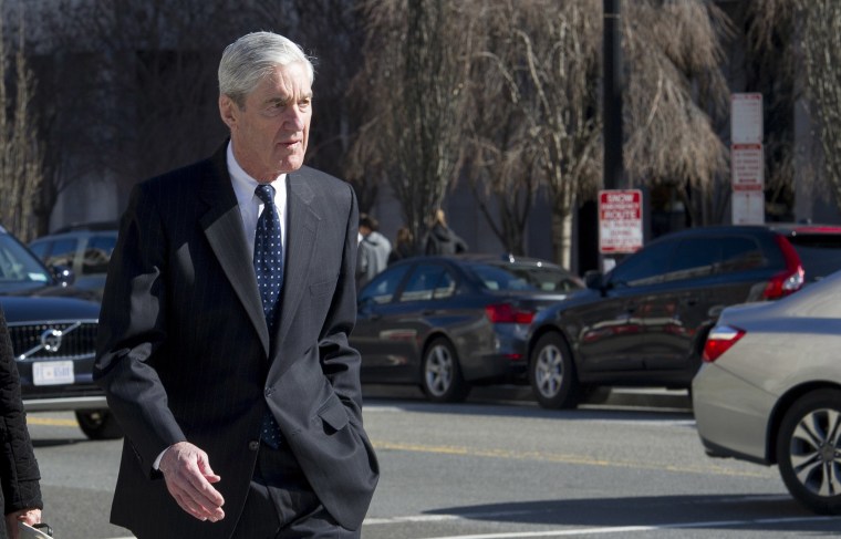 Image: Special Counsel Robert Mueller walks to his car after attending services at St. John's Episcopal Church, across from the White House, in Washington