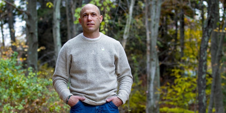 Jeremy Richman stands in the backyard of his home in Newtown, Connecticut in 2012.