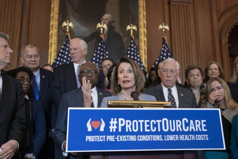 Image: Speaker of the House Nancy Pelosi, D-Calif. leads an event to announce legislation to lower health care costs and protect people with pre-existing medical conditions, at the Capitol