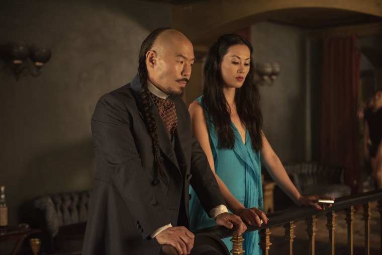 Hoon Lee -- who plays "Wang Chao," a fixer in 19th Century San Francisco -- with Olivia Cheng.