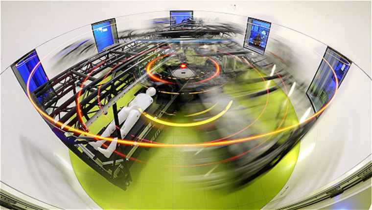 Image: :envihab human centrifuge. By spinning people, blood is encouraged to flow back towards the feet as artificial gravity is created.