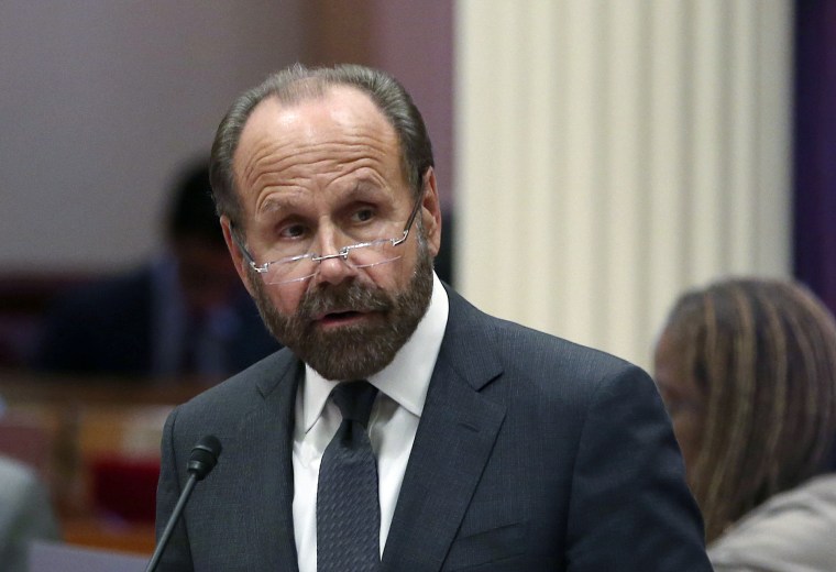 Image: State Sen. Jerry Hill speaks on the floor of the Senate in Sacramento, California, on Aug. 27, 2018.