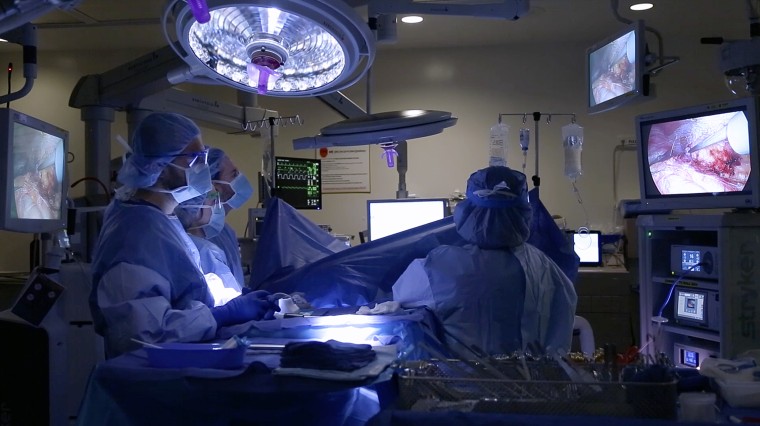 Image: Surgeons operate on Nina Martinez, who is thought to be the world's first kidney transplant living donor with HIV, in Baltimore on March 25, 2019.