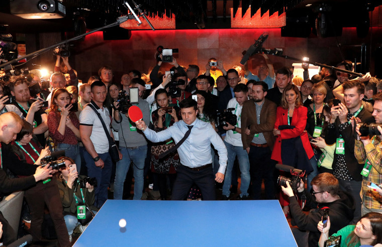 Image: Volodymyr Zelenskiy plays table tennis at his campaign headquarters