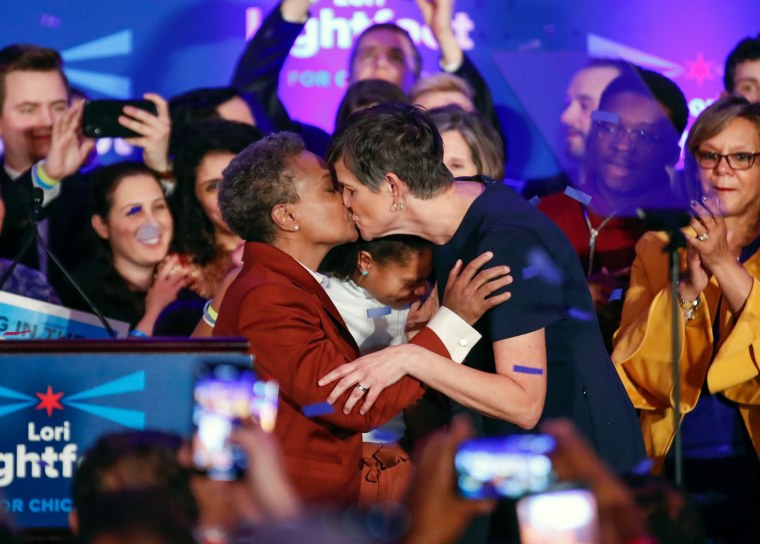 Image: Chicago mayor elect Lori Lightfoot kisses her wife, Amy Eshleman, during her election night party in Illinois on April 2, 2019.