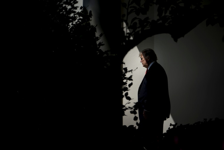 Image: President Donald Trump walks from the White House on Aug. 22, 2017.