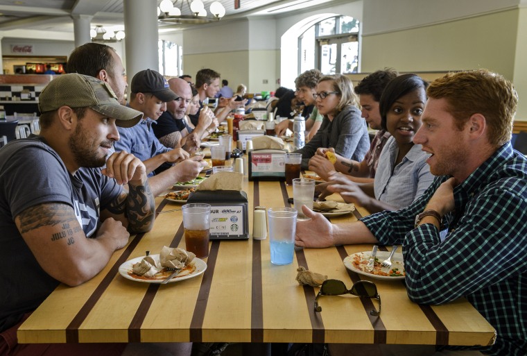 Image: Military veterans dine on campus at Georgetown University in Washington on July 30, 2015.