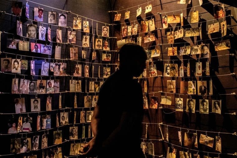 Image: Photos of people who were killed in the 1994 Rwandan genocide hang in the Kigali Genocide Museum on April 6, 2019.