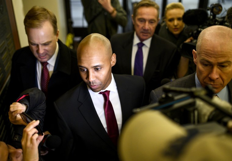 Image: Former Minneapolis Police officer Mohamed Noor arrives with his lawyers for the beginning of his trial on April 1, 2019 in Minneapolis.
