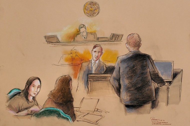 Image: Yujing Zhang appears with her defense attorney Robert Adler before U.S. Magistrate Judge William Matthewman at her hearing at the U.S. federal court in West Palm Beach