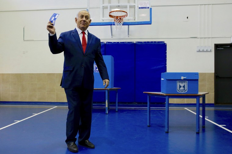 Image: Israel's Prime Minister Benjamin Netanyahu casts his vote on Tuesday.
