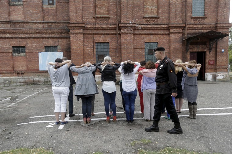 Image: Participants in a session at the former military prison