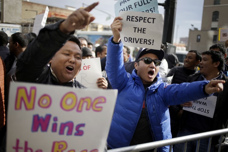 Image: Uber drivers protest outside of an Uber office in New York on Feb. 1, 2016.