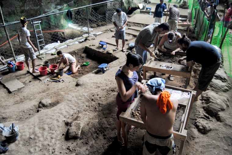 Image: The excavation crew at the Callao Cave in the north of Luzon Island, in the Philippines, where an international multidisciplinary team discovered a new hominin species, Homo Luzonensis, on Aug. 9, 2011.
