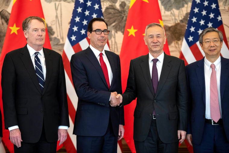 Image: China's Vice Premier Liu He shakes hands with U.S. Treasury Secretary Steven Mnuchin as Yi Gang, governor of the People's Bank of China (PBC) and U.S. Trade Representative Robert Lighthizer stand next to them, at Diaoyutai State Guesthouse in Beiji