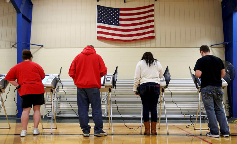 Image: Voters cast their votes during the U.S. presidential election in Ohio