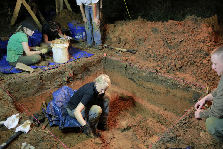 Dr. Erin Kimmerle exhumes a grave at the Boot Hill cemetery at the now closed Arthur G. Dozier School for Boys in Marianna