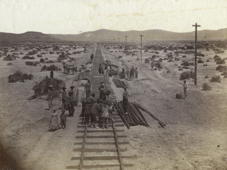Image: Workers construct a section of the Central Pacific Railroad on the Humboldt Plains in Nevada.