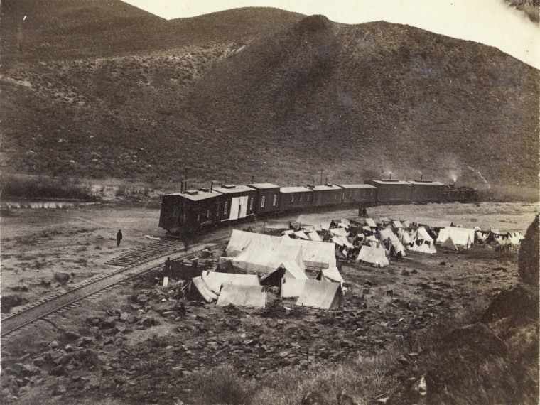 Image: A camp of Chinese workers at the end of the Central Pacific Railroad's tracks in the desert.