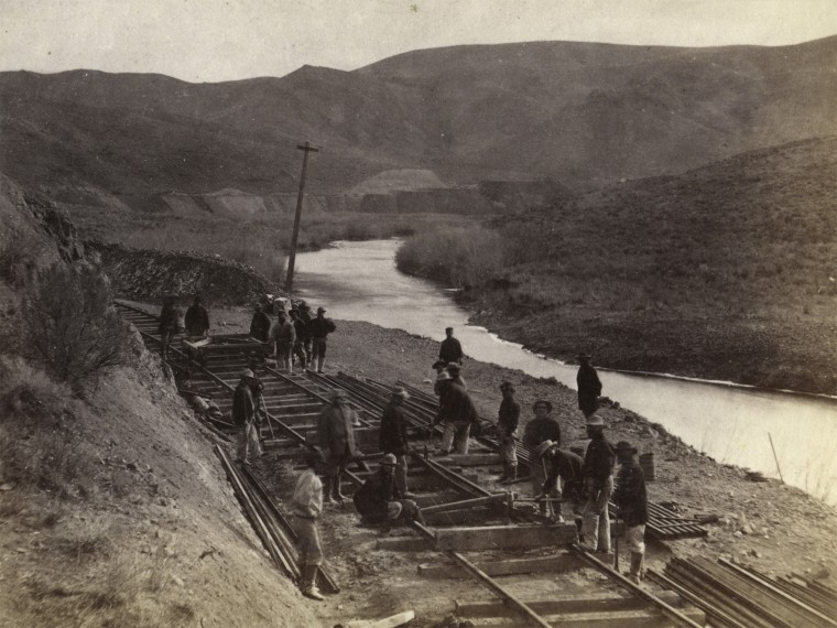 Image: Workers lay track along the Ten Mile Canyon stretch of the Transcontinental Railroad