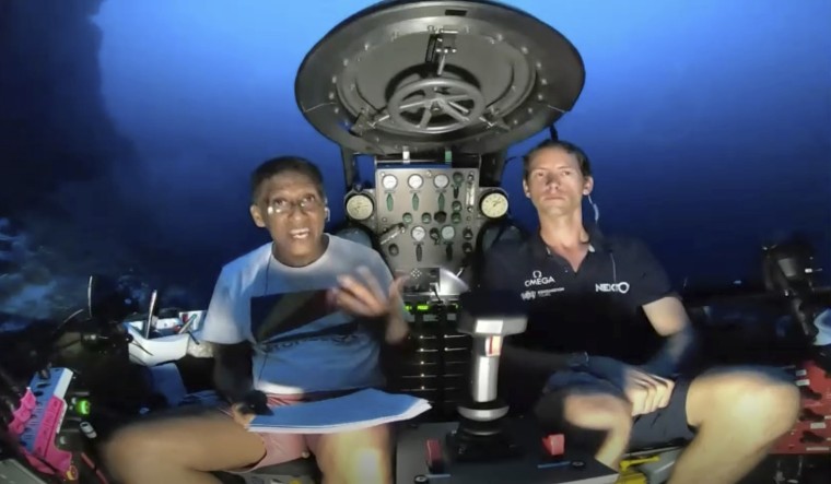 Image: Seychelles President Danny Faure, left, speaks from insider a submersible of the vessel Ocean Zephyr underwater off the coast of Desroches on April 14, 2019.