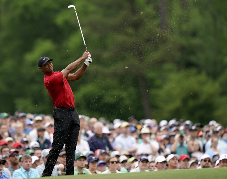 Image: Tiger Woods swings on the 12th hole during the final round of The Masters in Augusta, Georgia, on April 14, 2019.