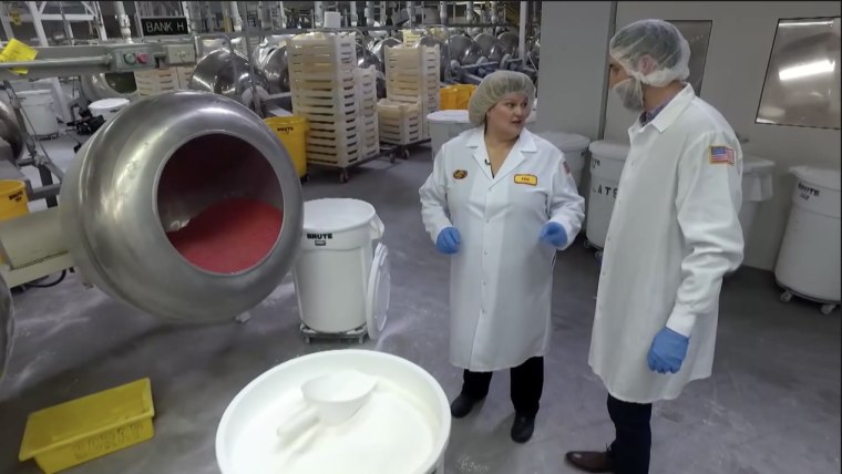Joe Fryer and Lisa Brasher perform "the art" of Jelly Belly-making: The candies' shells.