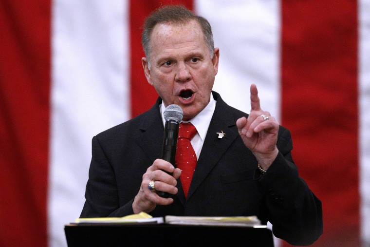 Image: Republican candidate for U.S. Senate Judge Roy Moore speaks during a campaign rally in Midland City