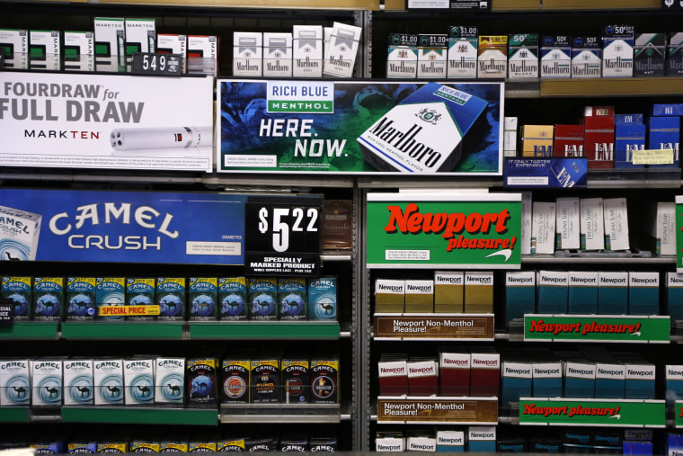 Camel and Newport cigarettes, both Reynolds American brands, are on display at a Smoker Friendly shop in Pittsburgh in 2015.