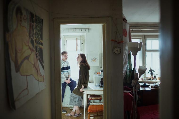 Image: Alisa Gorshenina speaks with her husband, Sergey, in their kitchen in Nizhny Tagil, Russia